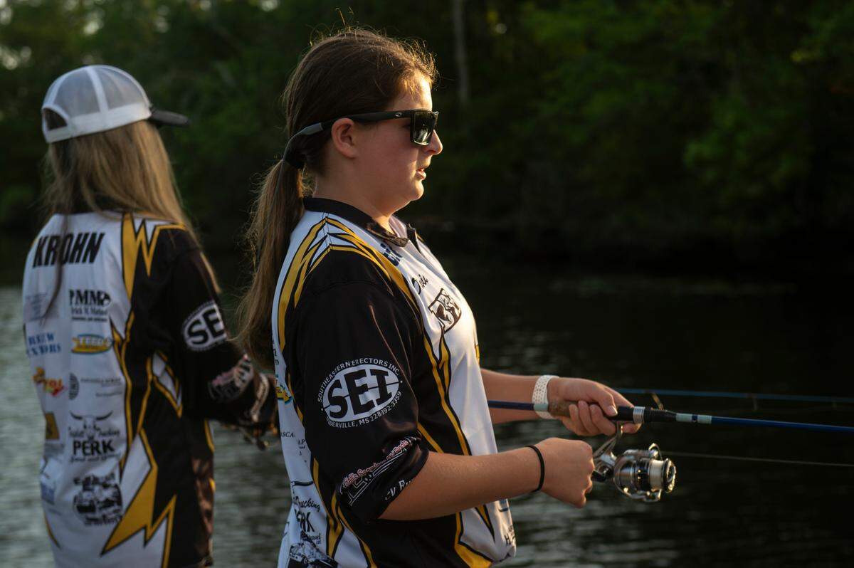 D’Iberville Bass Fishing Team members Olivia King, right, and Harper Krohn fish on the Tchoutacabouffa River in D’Iberville on Monday, June 3, 2024. In May, King and Krohn became Mississippi’s first-ever all-girls bass fishing state champions out of the junior division.