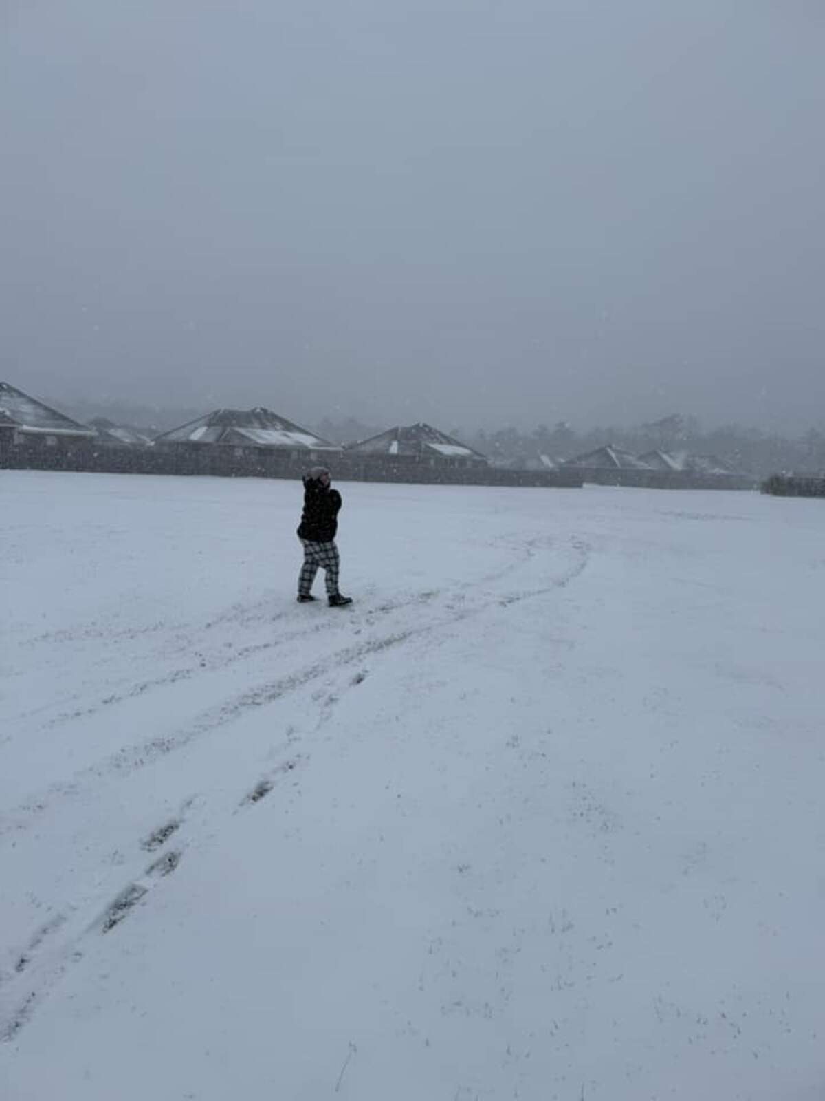 Facebook user Iluvu Amy Eff took this photo in St Martin, Mississippi. “I ate all my snow food before the snow came, but that’s okay. I’m 26 years old but still enjoyed a snowball fight and making a snow angel. We gave up on the snow man after the bottom part.”