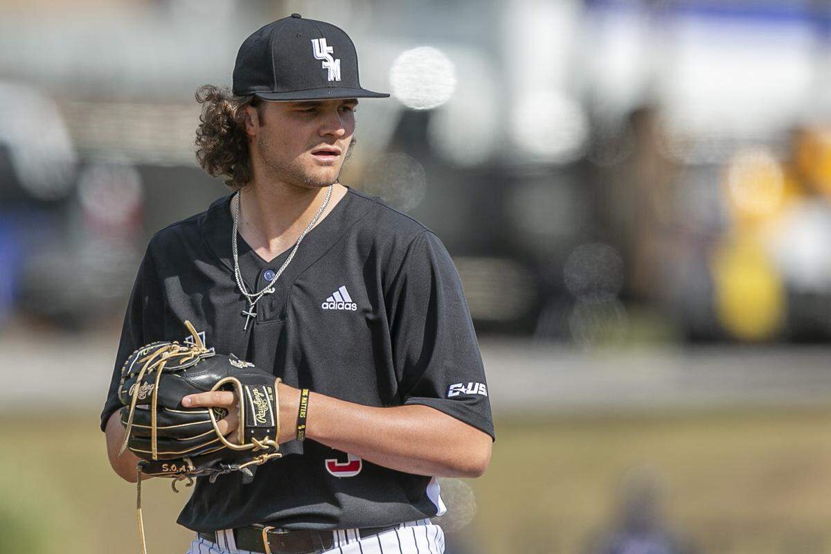 Southern Miss’ Landon Harper prepares to throw a pitch during a game against Florida Atlantic University at Pete Taylor Park in Hattiesburg on Saturday, March 19, 2022.
