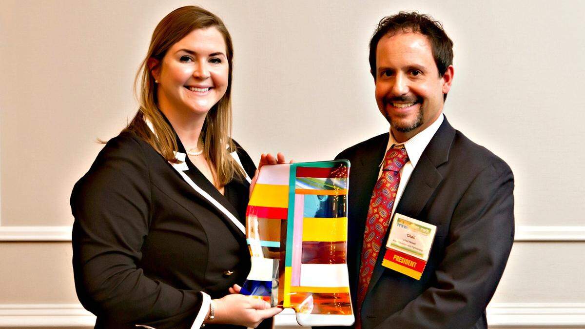 HANCOCK COUNTY PORT COMMMISSION 
 Janel Carothers, left, Hancock County Port and Harbor Commission's chief development officer, accepts the Community Economic Development Award from Chad Newell, president of the Mississippi Economic Development Council.