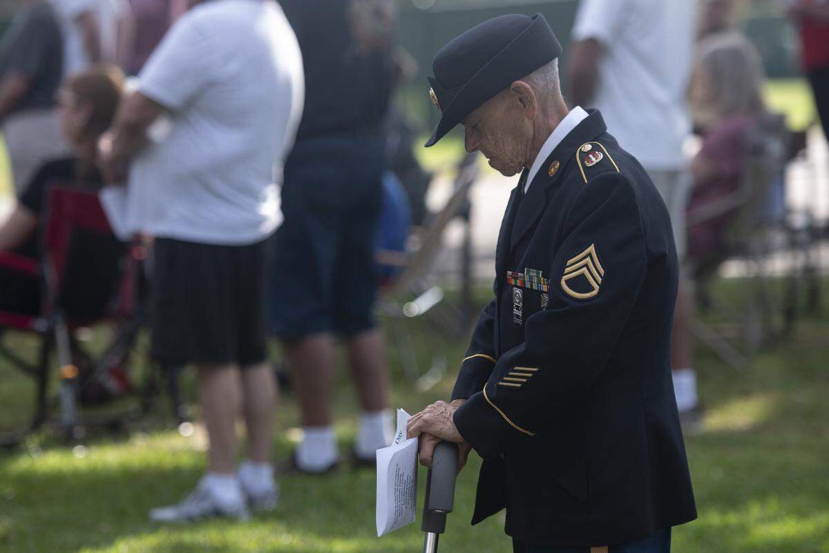 Veterans attend a Memorial Day ceremony at Biloxi National Cemetery in Biloxi on Monday, May 26, 2025.