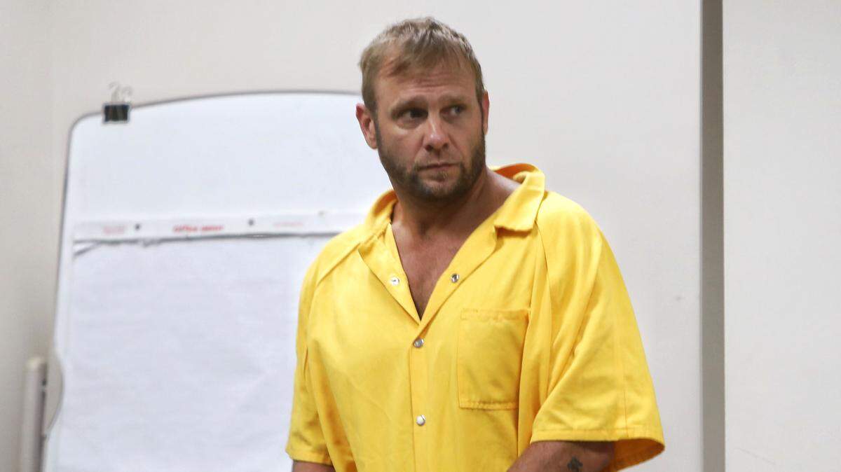 Former 3 Doors Down bassist Todd Harrell arrives at court for his initial appearance on weapons and drug charges in Jackson County during the summer of 2018.