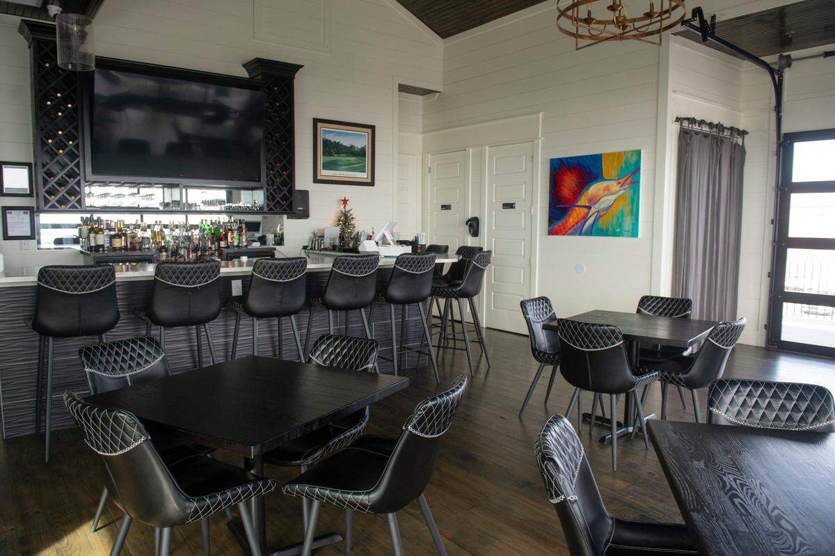 The second floor of Rags to Riches in Bay St. Louis on Thursday, Dec. 7, 2023. The two-story bar features a sports bar atmosphere on the first floor and a wine bar on the second floor.