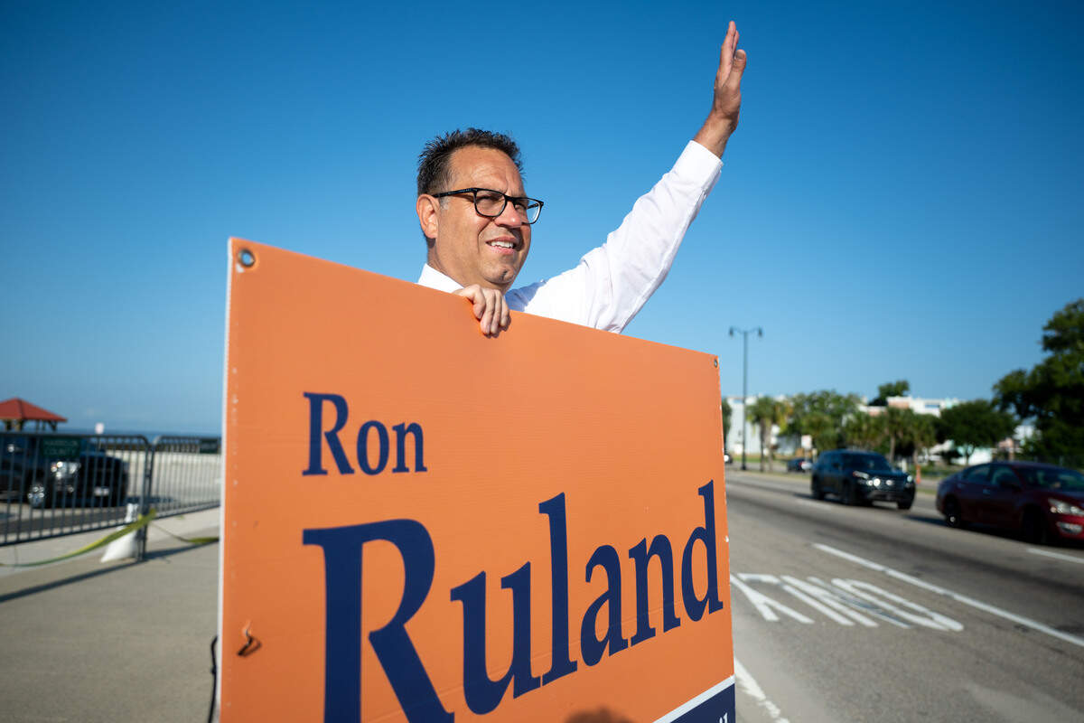Ron Ruland waves to passing cars on U.S. 90 as he promotes his special election campaign for Gulfport’s Ward 2 City Council seat on Tuesday, June 30, 2026. Ruland lost the race to Bryan Caldwell.