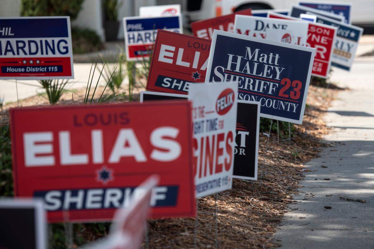 Election signs outside a polling location at the Lopez-Quave Public Safety Center in Biloxi during the Mississippi Primary Election on Tuesday, Aug. 8, 2023.