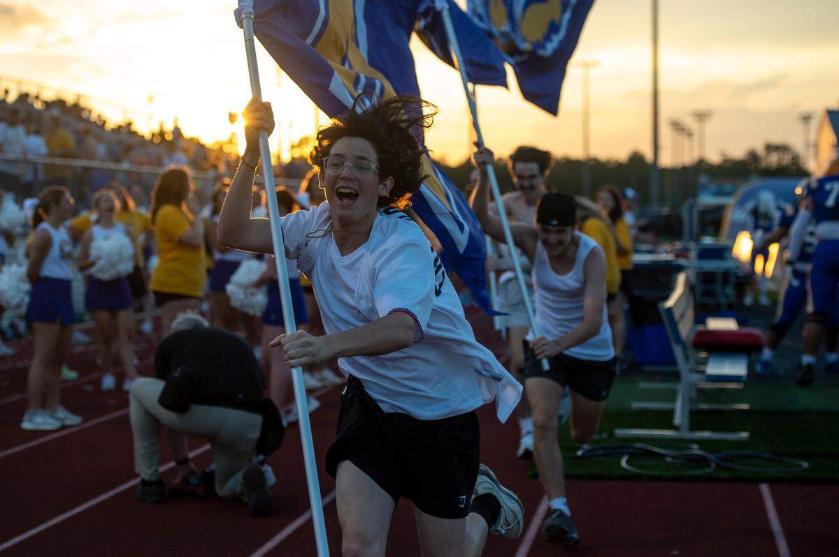 The Bay High students cheer on the Tigers during a game at Bay High in Bay St. Louis on Friday, Sept. 1, 2023.