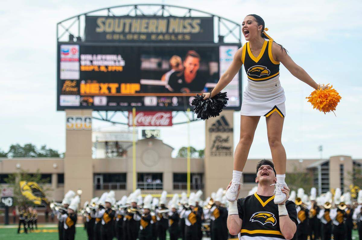 Cheerleaders celebrate before a Southern Miss game at M.M. Roberts Stadium in Hattiesburg on Saturday, Sept. 2, 2023.