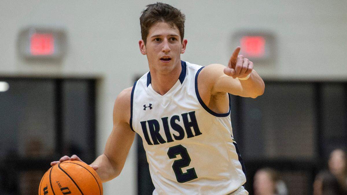 St. Patrick guard Nick Krass points to the crowd during a game against Perry Central at St. Patrick Catholic High School on Thursday, Jan. 13, 2022.