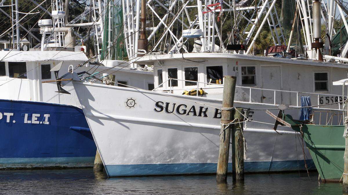 TIM ISBELL/SUN HERALD 
 Rudy Tolar's boat Sugar Babe sits in a slip at at Pass Christian harbor, Wednesday, Jan. 6, 2016. Tolar recently paid his slip fee although he can't fish for oysters.
