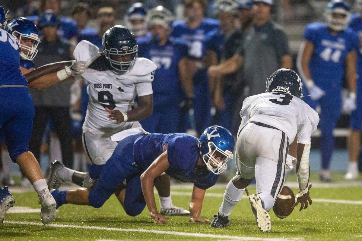Moss Point’s Taboris Charles (3) recovers the ball after a fumble during a game against Vancleave at Vancleave Football Stadium in Vancleave on Friday, Sept. 9, 2022.