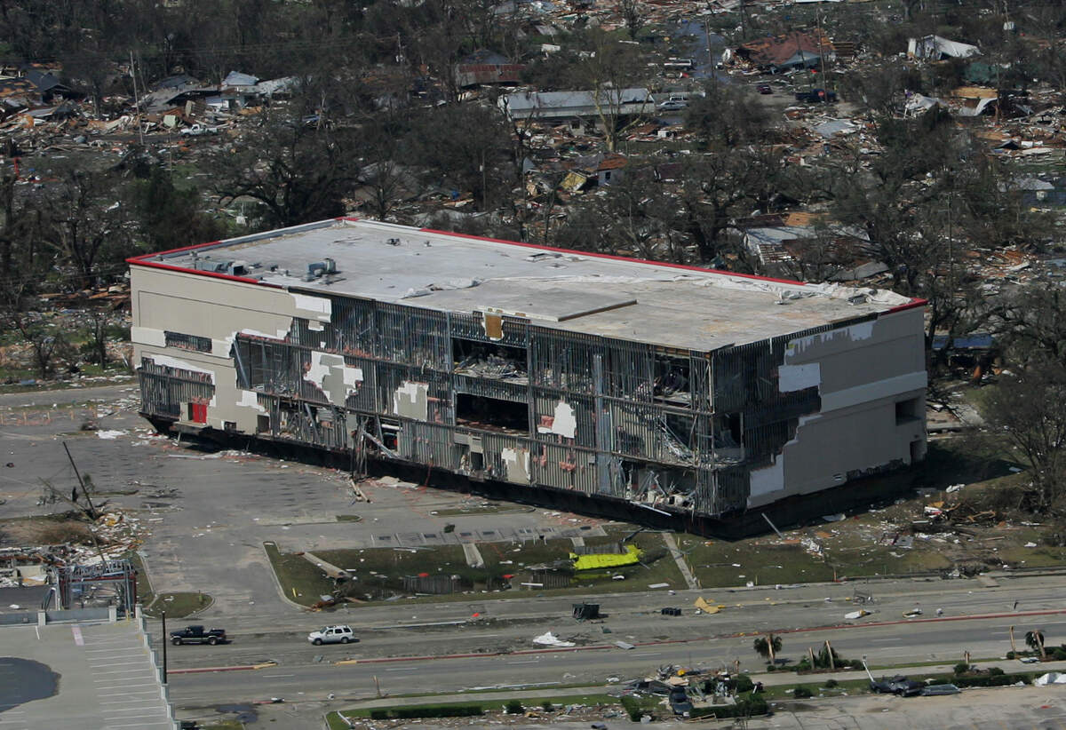 Casino Magic’s barge was lifted by Hurricane Katrina's storm surge and came to rest on the north side of U. S. 90 near St. Michael Catholic Church in Biloxi, MS, on Aug. 29, 2005. This aerial photo was taken the next day.