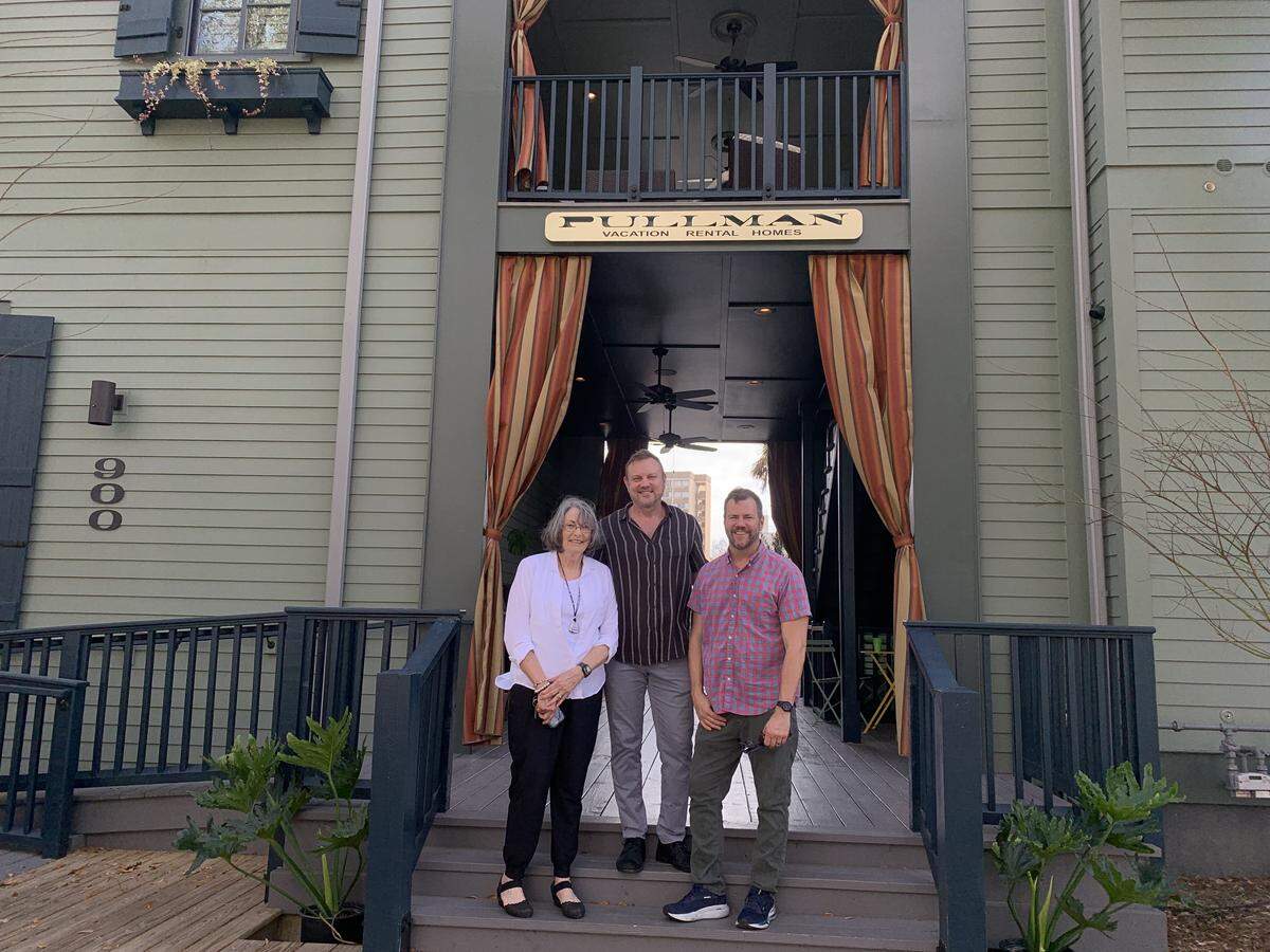 New Orleans architect Jonathan Cothern, center, is joined by his mother Betty Doster and partner Daniel Burton at The Pullman House in Ocean Springs.