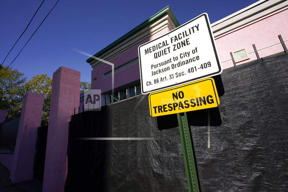 A posted sign indicating a “Medical Facility Quiet Zone” is displayed outside the Jackson Women’s Health Organization clinic. (AP Photo/Rogelio V. Solis) Mississippi Coast residents can drive to nearby states with lighter abortion laws.