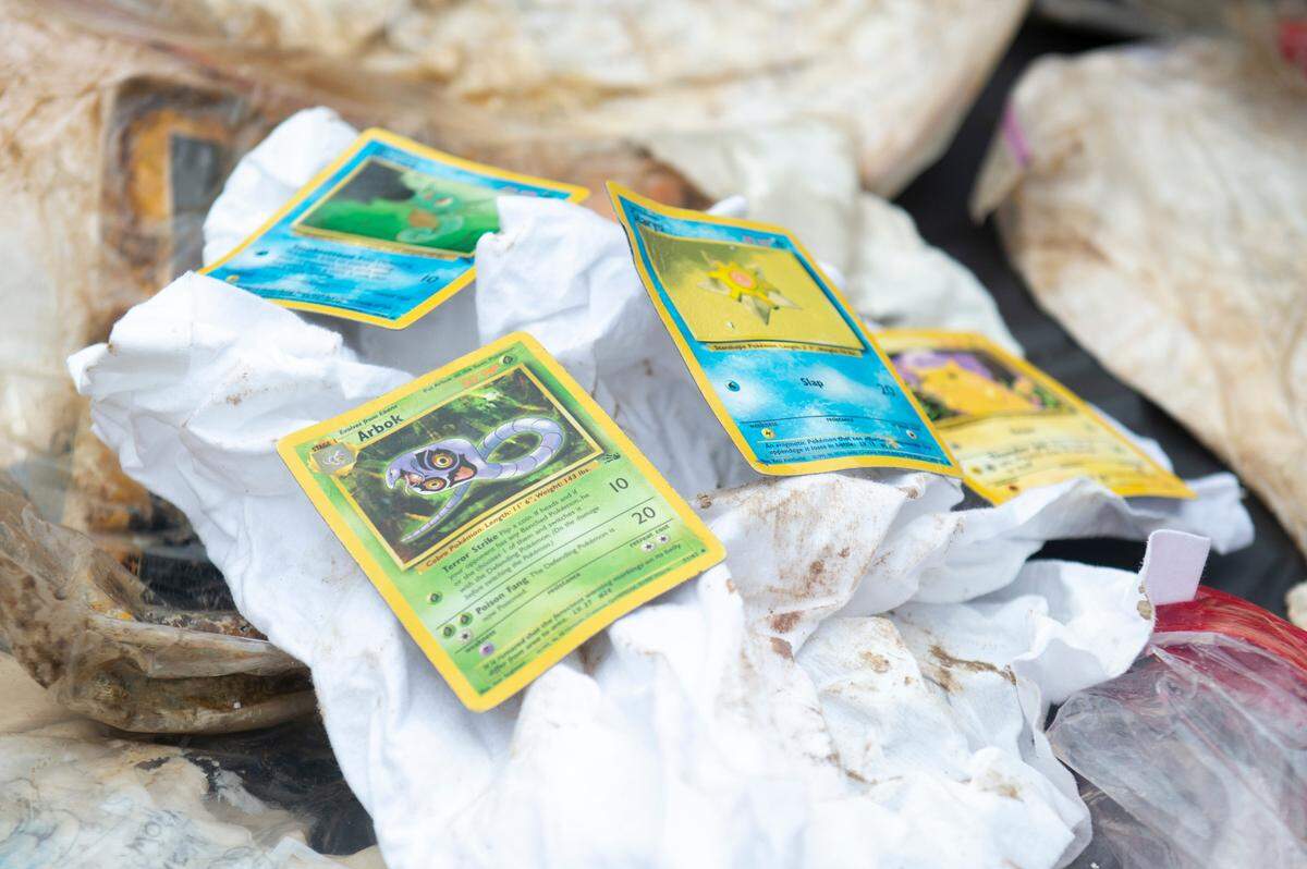 Pokémon cards were among the items from a time capsule that was buried at W. J. Quarles Elementary in Long Beach in 1999 and opened on Friday, Dec. 13, 2024.