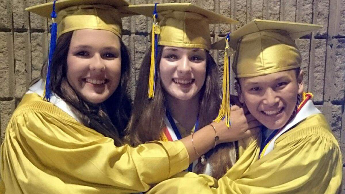 GORDON JACKSON/SPECIAL TO THE SUN HERALD 
 From left, St. Martin High School Class of 2016 Salutatorian Jordan Wescovich, Valedictorian Olivia George and Historian Tan Tran on Monday, May 23, 2016 at the Mississippi Coast Coliseum.