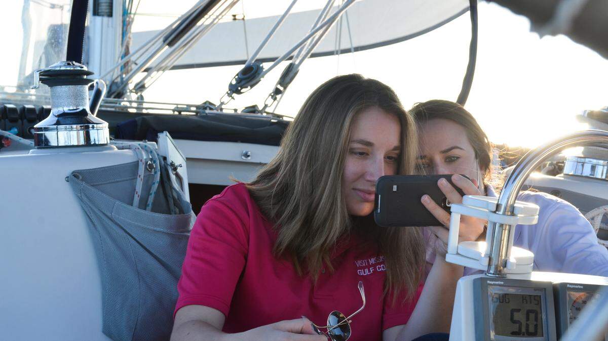 JUSTIN MITCHELL/SUN HERALDErin Kenna and Kelsey King of Visit Mississippi Gulf Coast take a selfie while on a sail near the Gulfport Harbor to capture footage of the Mississippi Sound for Google Trekker