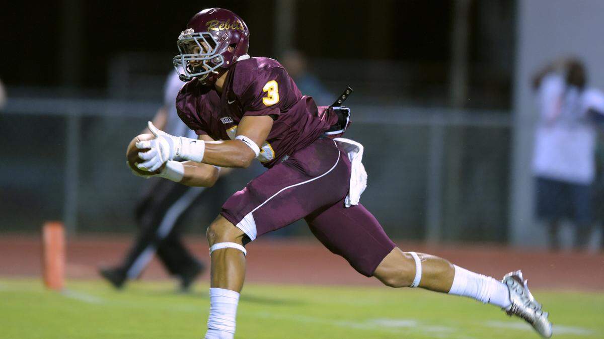GLENN ANDREWS/SPECIAL TO THE SUN HERALD 
 George County wide receiver Tyrese Fryfogle (3) pulls in a touchdown pass against Pascagoula on Sept. 11 at George County High School in Lucedale.