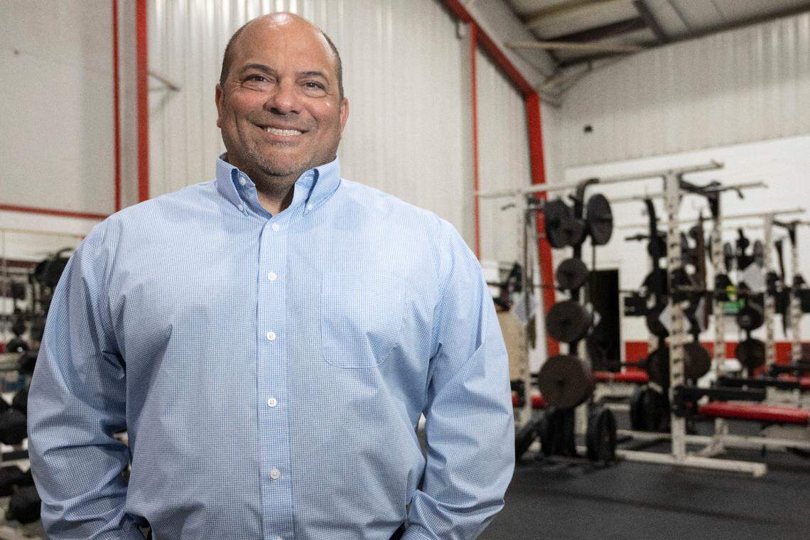 Brenan Compretta poses for a portrait at Harrison Central High School, where Jeremy Turcotte, not pictured, now coaches, on Tuesday, June 10, 2025. Compretta and Turcotte coaches the Bay High football team in the immediate aftermath of Hurricane Katrina.