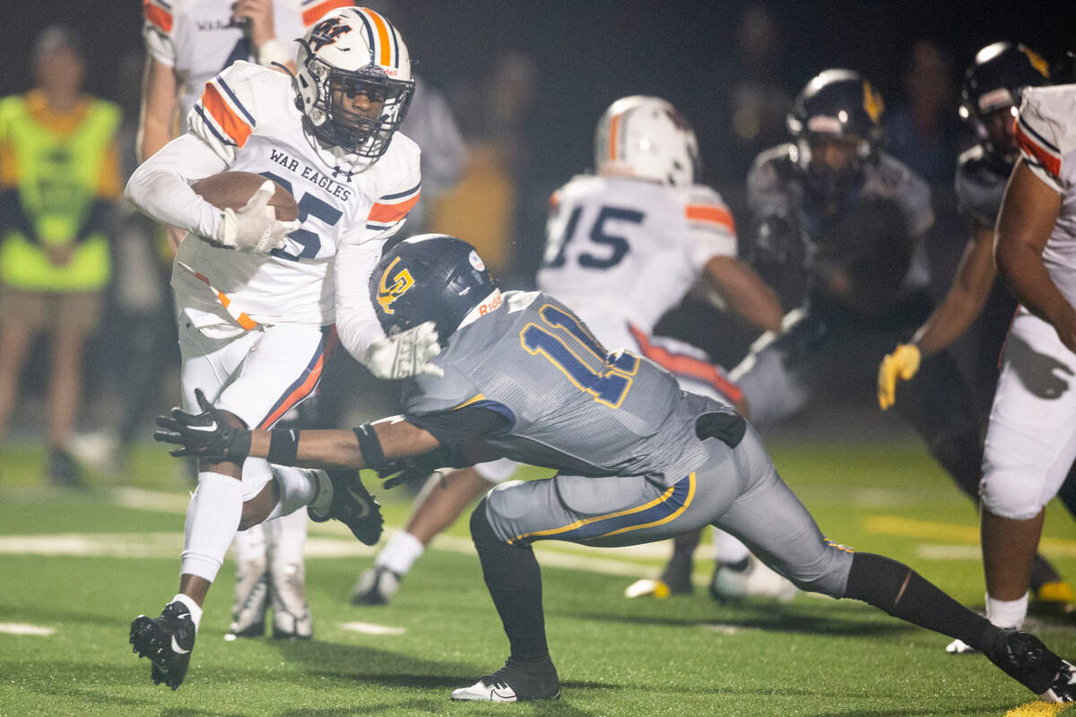 Gautier’s Shamarie Carroll tackles Wayne County’s ball carrier during a playoff game against Wayne County at Gautier High School in Gautier on Friday, Nov. 11, 2022.