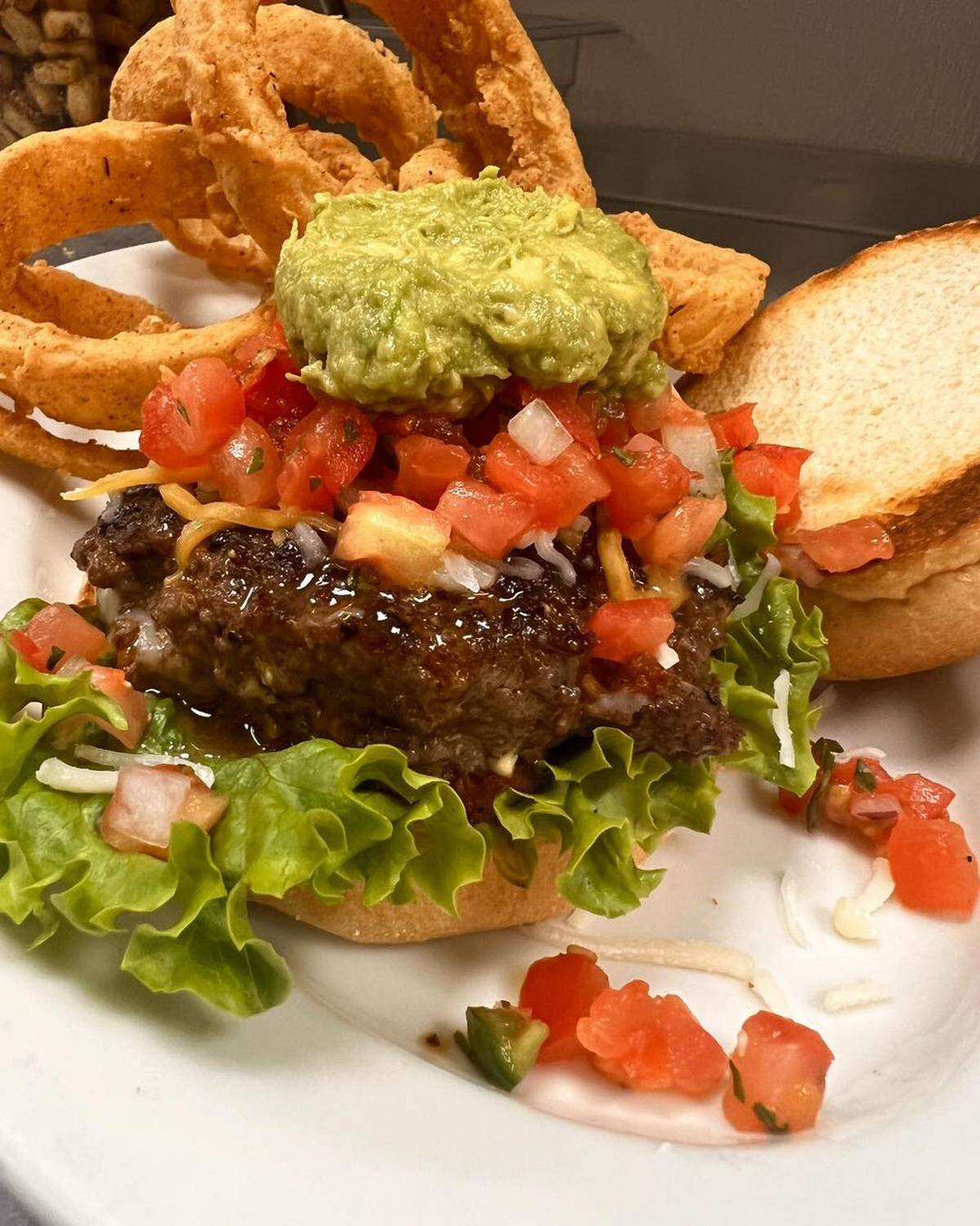 One of Woody’s specialty burgers is the taco burger.