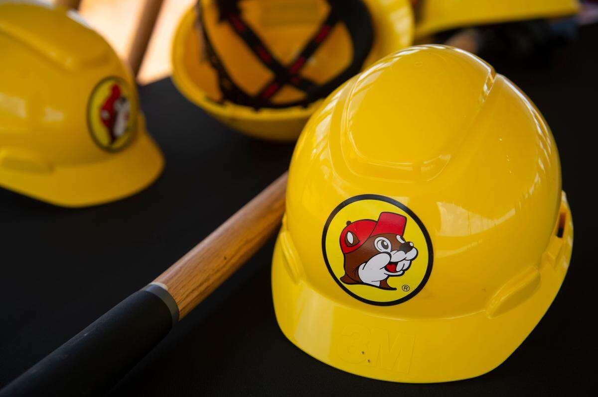Hard hats with the Buc-ee’s logo are displayed at the site of the future Harrison County Buc-ee’s after a ground breaking for the travel center on Tuesday, Sept. 12, 2023.