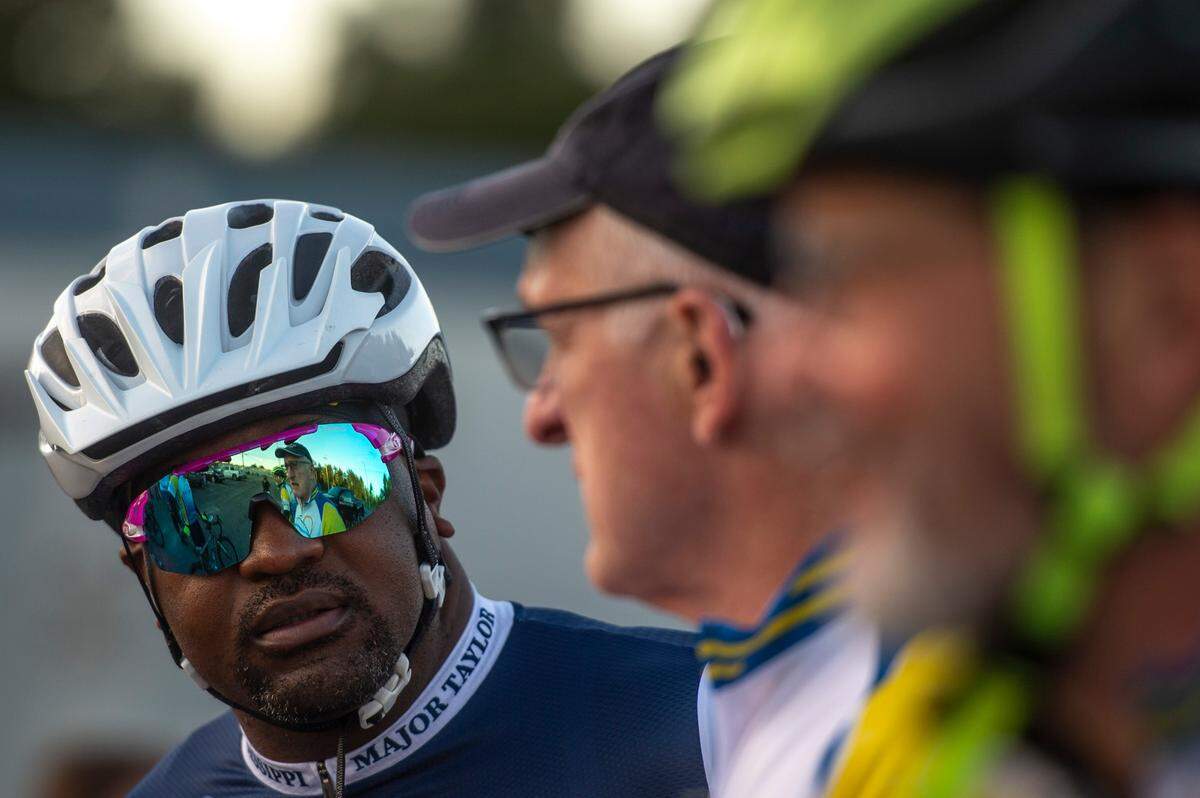 Louis Henderson, left, of Soul City Cycling, talks with Steve Stage before a 60 mile bike ride in Woolmarket on Saturday, Sept. 25, 2021.