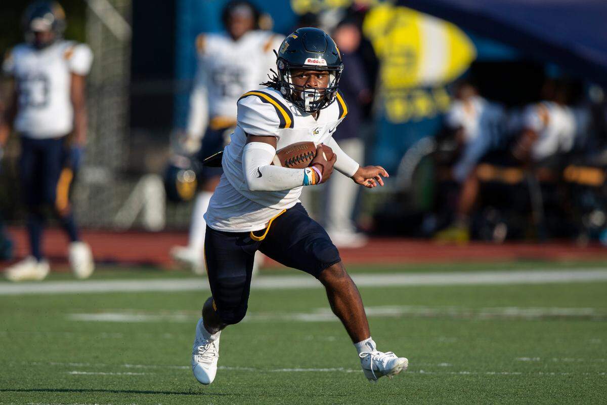 Gautier’s Solomon Baggett runs the ball during a Jamboree game at Biloxi High School on Friday, Aug. 18, 2023.