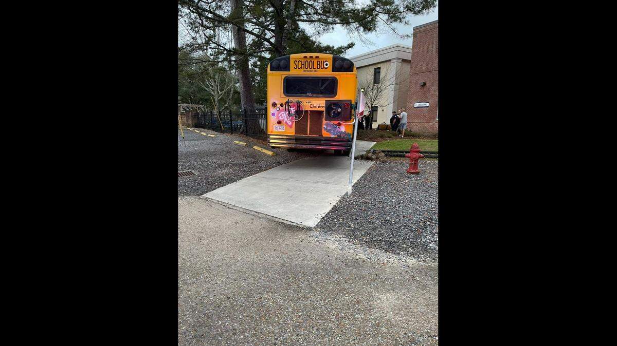 A Florida woman led police on a chase in an old school bus and crashed outside a Catholic school in Covington, Louisiana, on Feb. 7, deputies said.