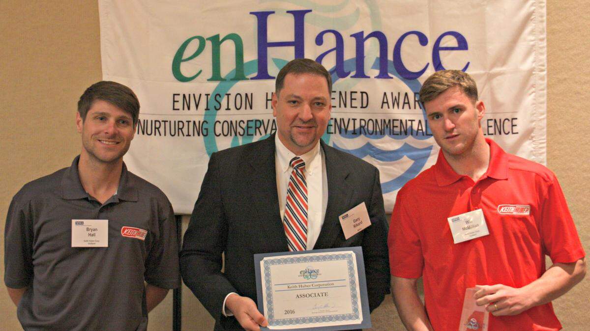 MDEQ 
 The Mississippi Department of Environmental Quality Executive Director Gary Rikard, center, presents an enHance certification to new member Keith Huber Corp. of Gulfport and Bryan Hall, left, and Will McMillian, right, from Keith Huber Corp.