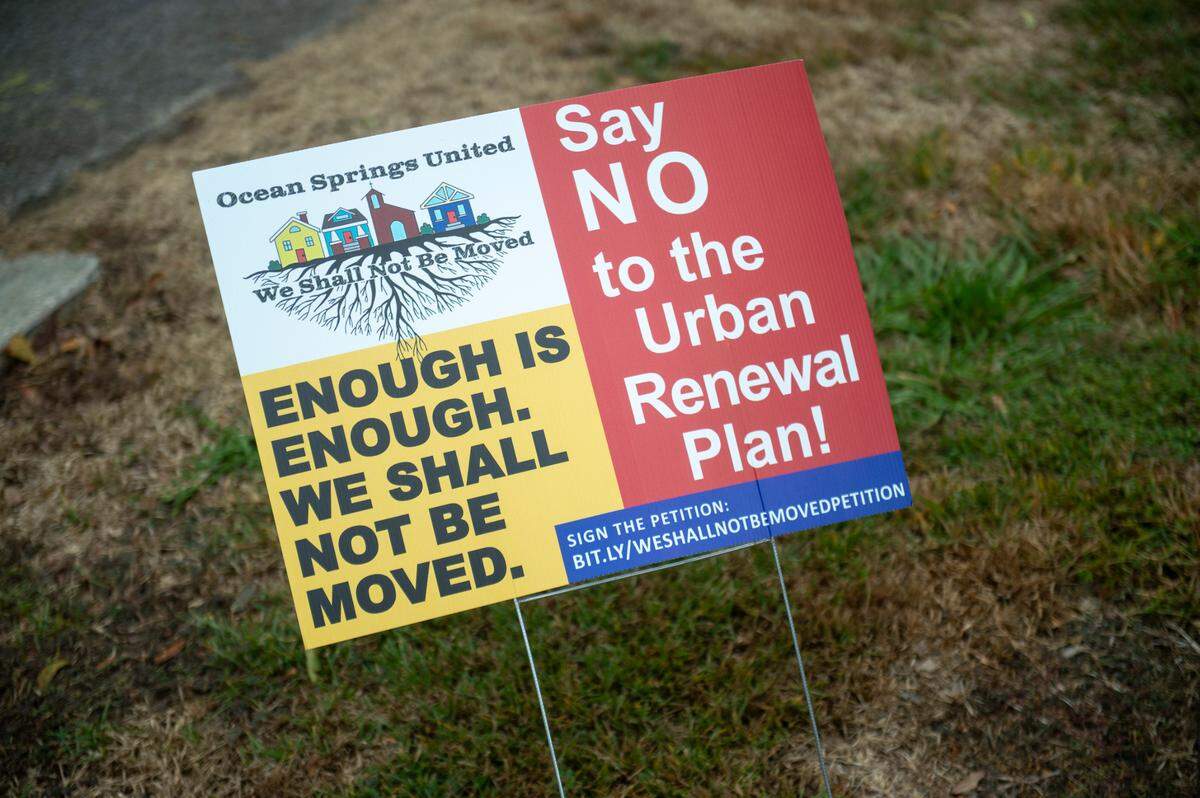 A sign that suggests residents sign a petition opposing an Urban Renewal Plan for the city of Ocean Springs is displayed in a resident’s yard on Thursday, Oct. 12, 2023.