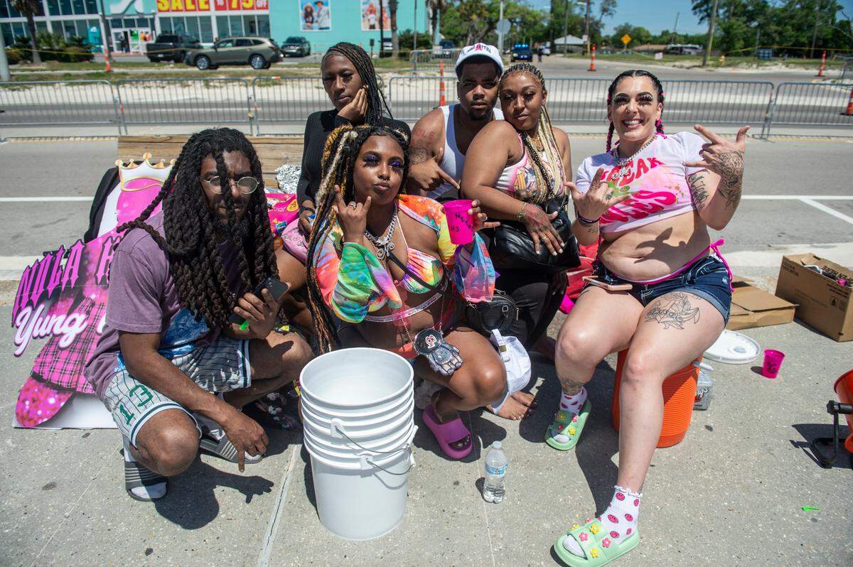 Spring breakers from New Orleans pose for a photo during Black Spring Break in Biloxi on Saturday, April 13, 2024.