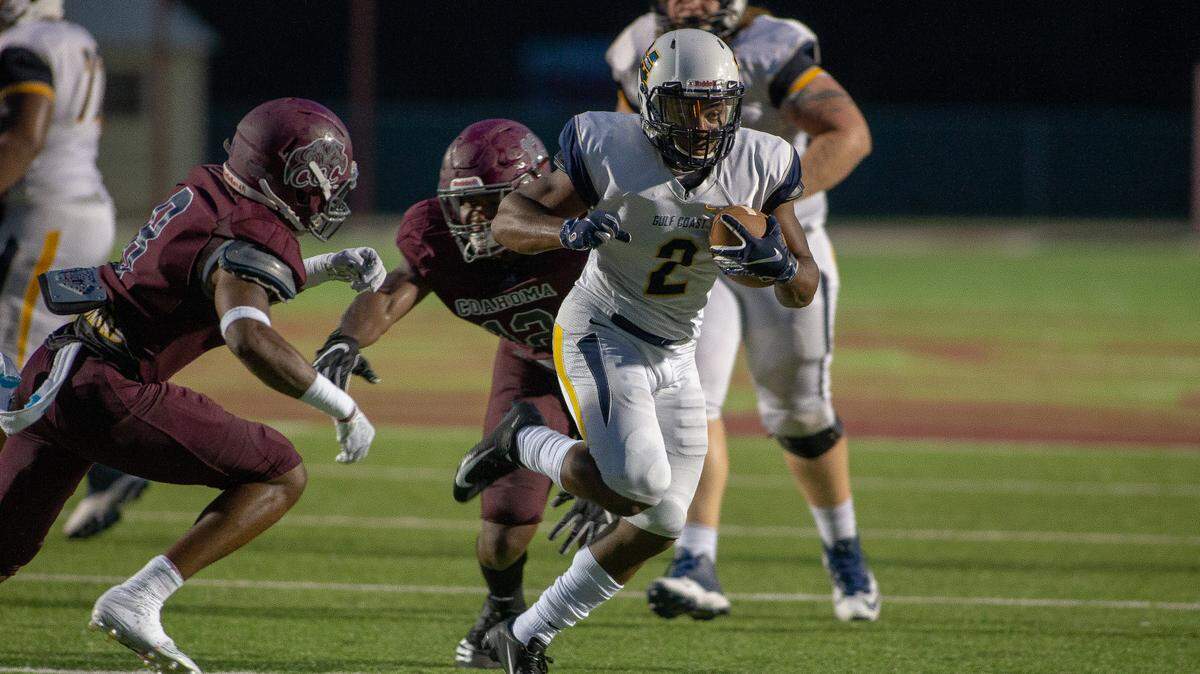 Mississippi Gulf Coast Community College running back Terrion Avery runs for positive yardage at Coahoma Community College on Thursday.