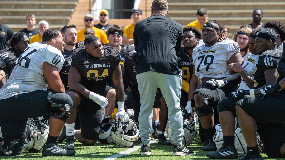 Coach Will Hall talks with his players after the Spring Game at M.M. Roberts Stadium in Hattiesburg on Friday, April 1, 2022.