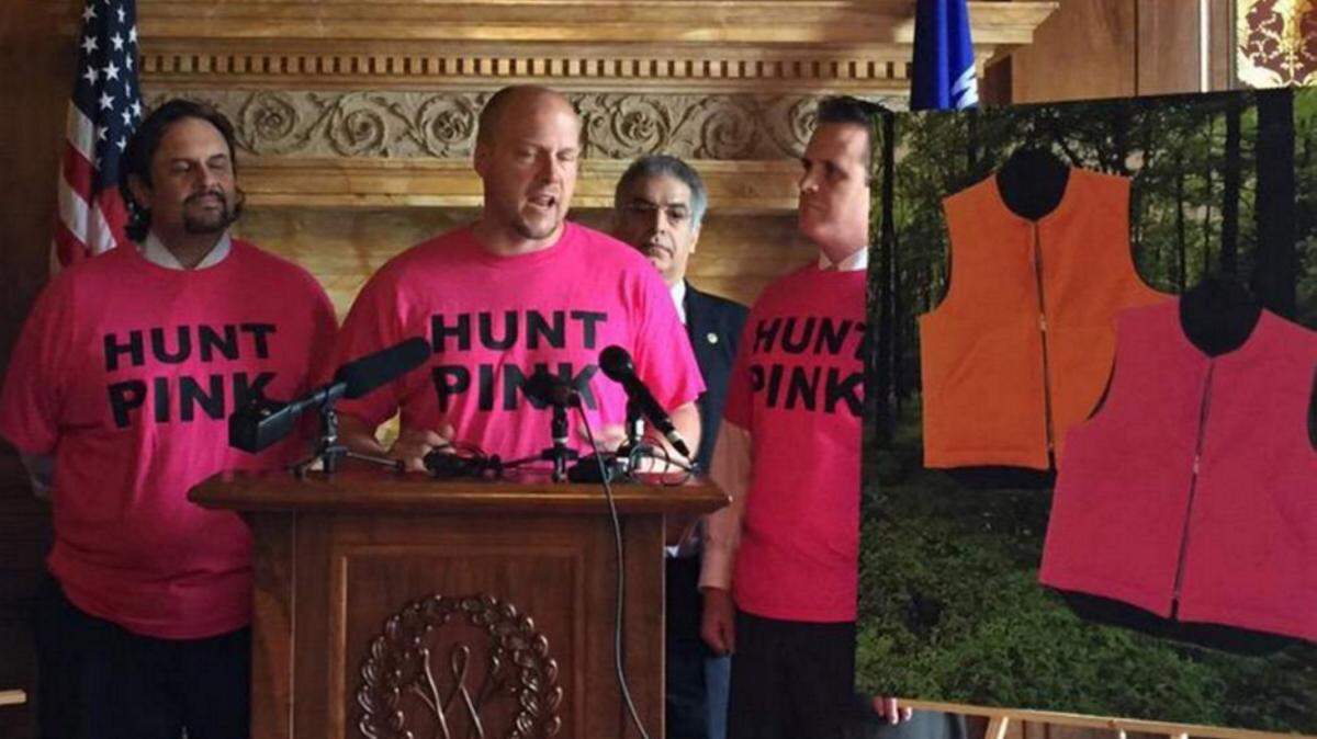 MILKWAUKEE JOURNAL SENTINEL/FILE 
 Wisconsin legislators unveil their bill to legalize blaze pink attire for hunters at the Capiton in Madison in 2015. From left is state Reps. Joel Kleefisch, Nick Milroy, University of Wisconsin Madison professor Majid Sarmadi and Rep. David Steffen.