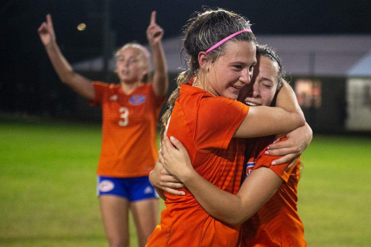 Members of the Gulfport girls soccer team celebrate after winning the 6A South State Championship game against Ocean Springs in Gulfport on Tuesday, Jan. 31, 2023. The team will advance to the state championship.