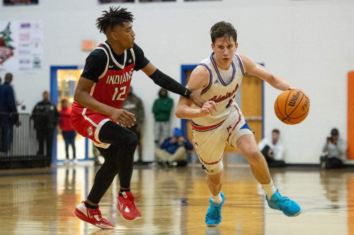 Gulfport’s Matt Krass dribbles the ball past Biloxi’s Duran Parish during a game against Biloxi at Gulfport High School in Gulfport on Friday, Jan. 13, 2023.