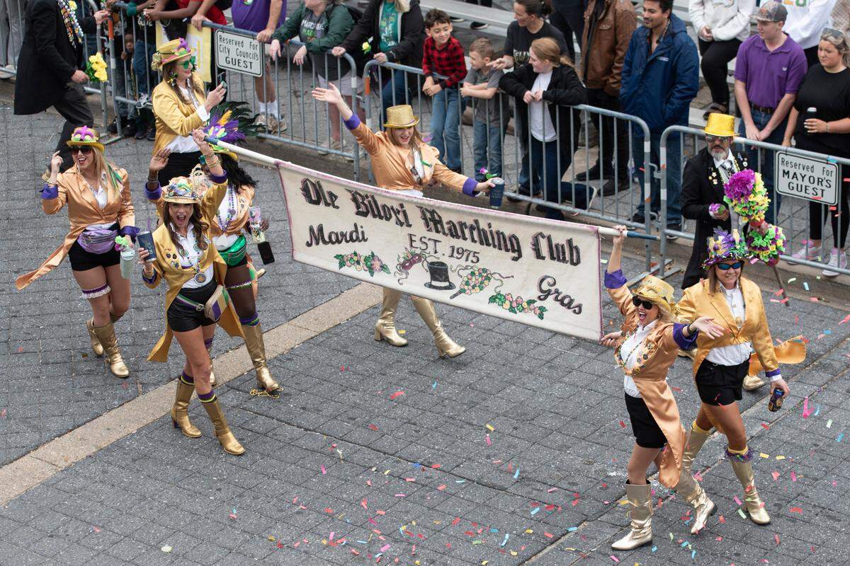 The Ole Biloxi Marching Club marches down Lameuse Street during the Gulf Coast Carnival Association Mardi Gras parade in Biloxi on Tuesday, March 4, 2025.