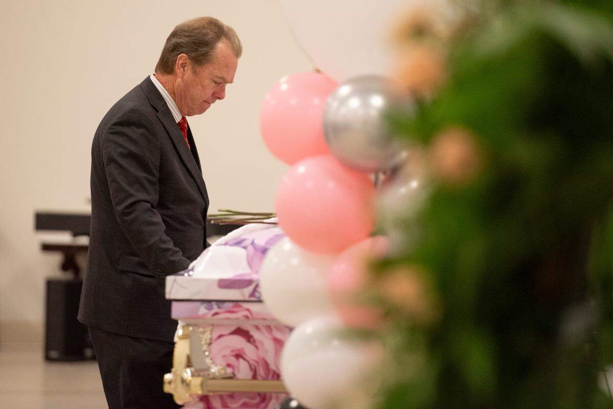 Gulfport Mayor Billy Hewes says his goodbyes to Ni’Kyra Dedeaux during her funeral at Lyman Community Center in Gulfport on Friday, Jan. 10, 2025. Dedeaux was killed in an alleged terrorist attack on Bourbon Street in New Orleans on Jan. 1.