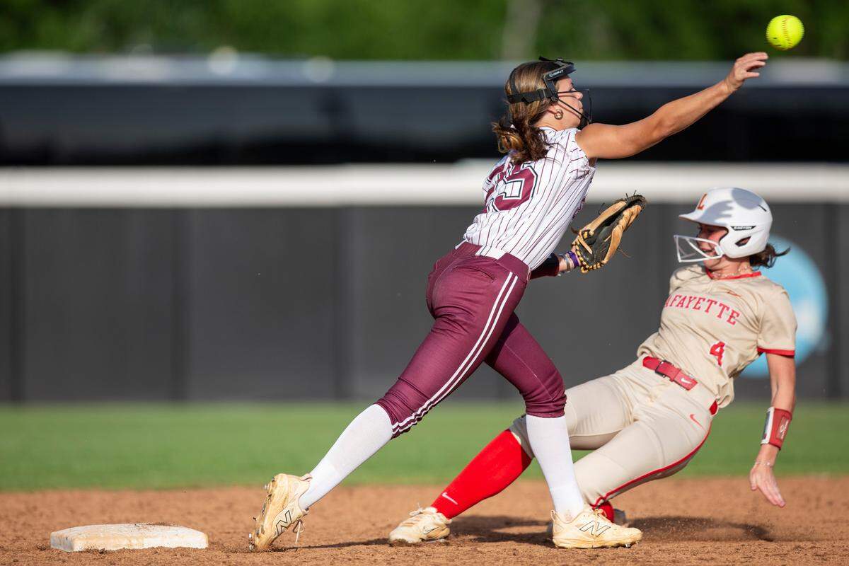 East Central’s Hailey Gordon throws a pass during the MHSAA 5A Softball Championship at USM Softball Complex in Hattiesburg on Wednesday, May 14, 2025.