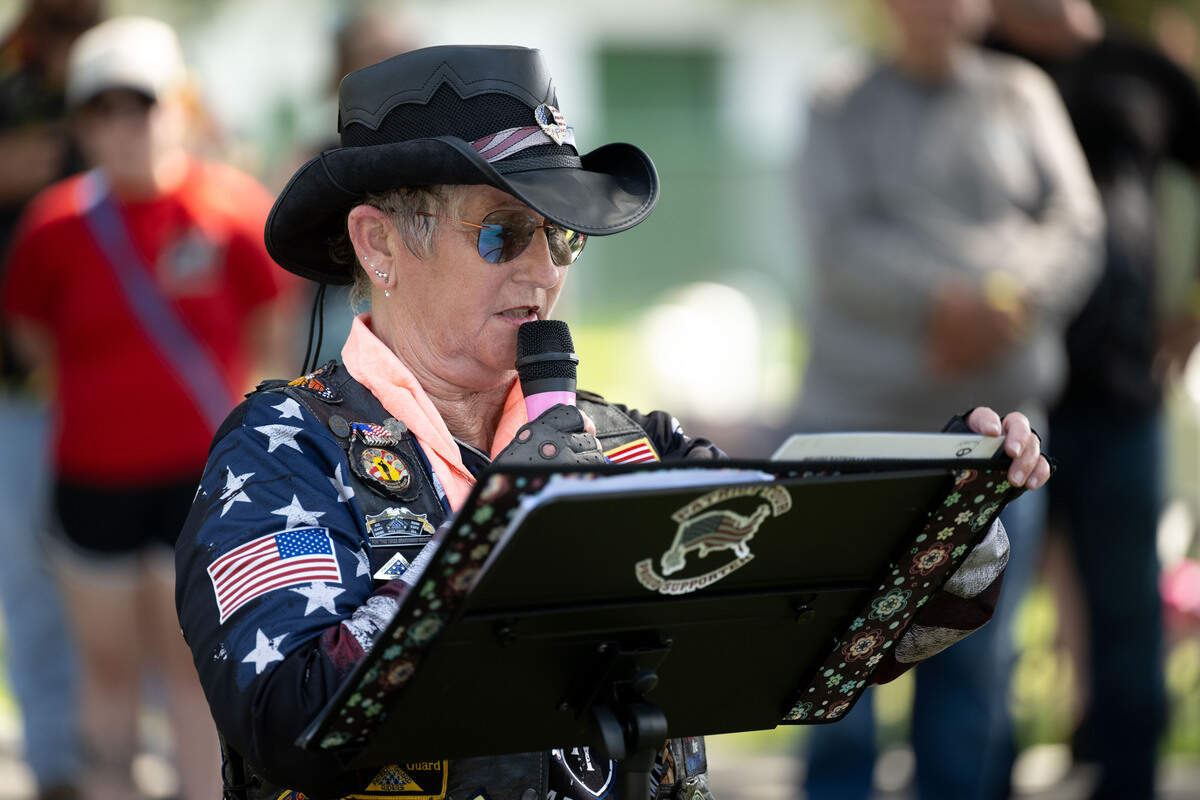 Kathy Collins-Lantz delivers a speech during a ceremony at Biloxi National Cemetery on Saturday, July 11, 2026.