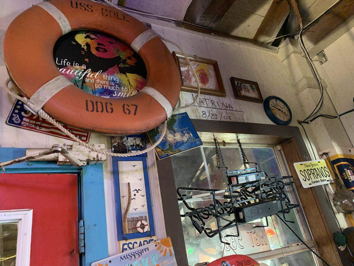 The water line from Hurricane Katrina is marked on the walls of Huck’s Cove in Gautier 20 years later.