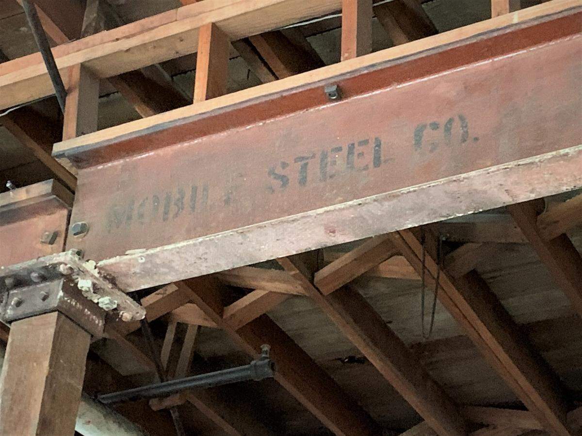 A massive steel beam stamped with “Mobile Steel Co.,” was one of the prime finds during the interior demo of the historic Barq Building in Biloxi.