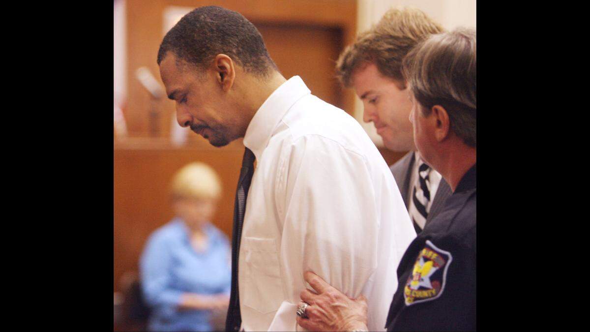 Alexander Lett, left, is led out of Jackson County Circuit Court after pleading guilty to murder and aggravated assault in the February 2005 shootings of Donald Ray Eddins and Ben Gaffney at Northrop Grumman in Pascagoula. Eddins died from his injuries 11 days after the shooting. Gaffney survived. At center is Lett’s attorney Calvin Taylor.