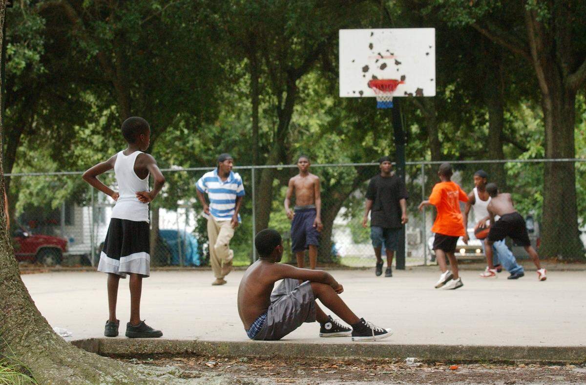 Playing basketball at the Willie Locke Community Center in Soria City in Gulfport in 2004.