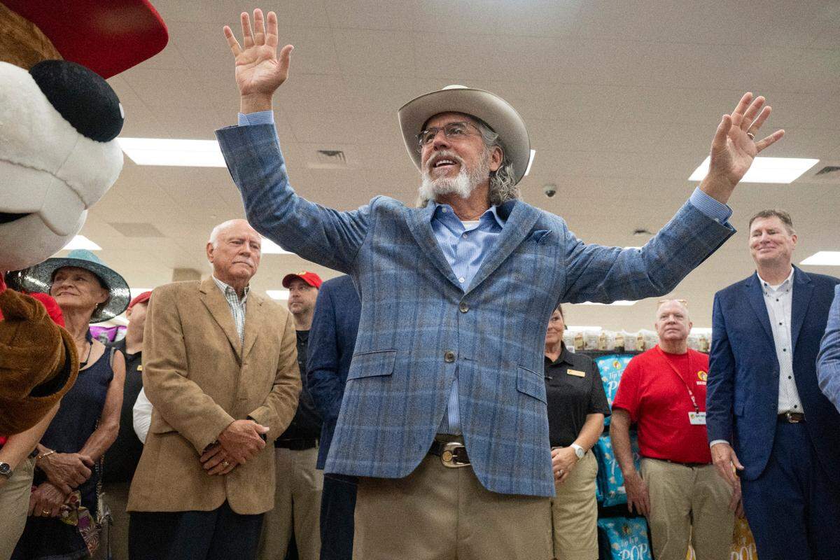 Buc-ee’s owner and founder Arch “Beaver” Aplin III waves to a crowd and media during a ribbon cutting ceremony for Mississippi’s Buc-ee’s in Harrison County on Monday, June 9, 2025.