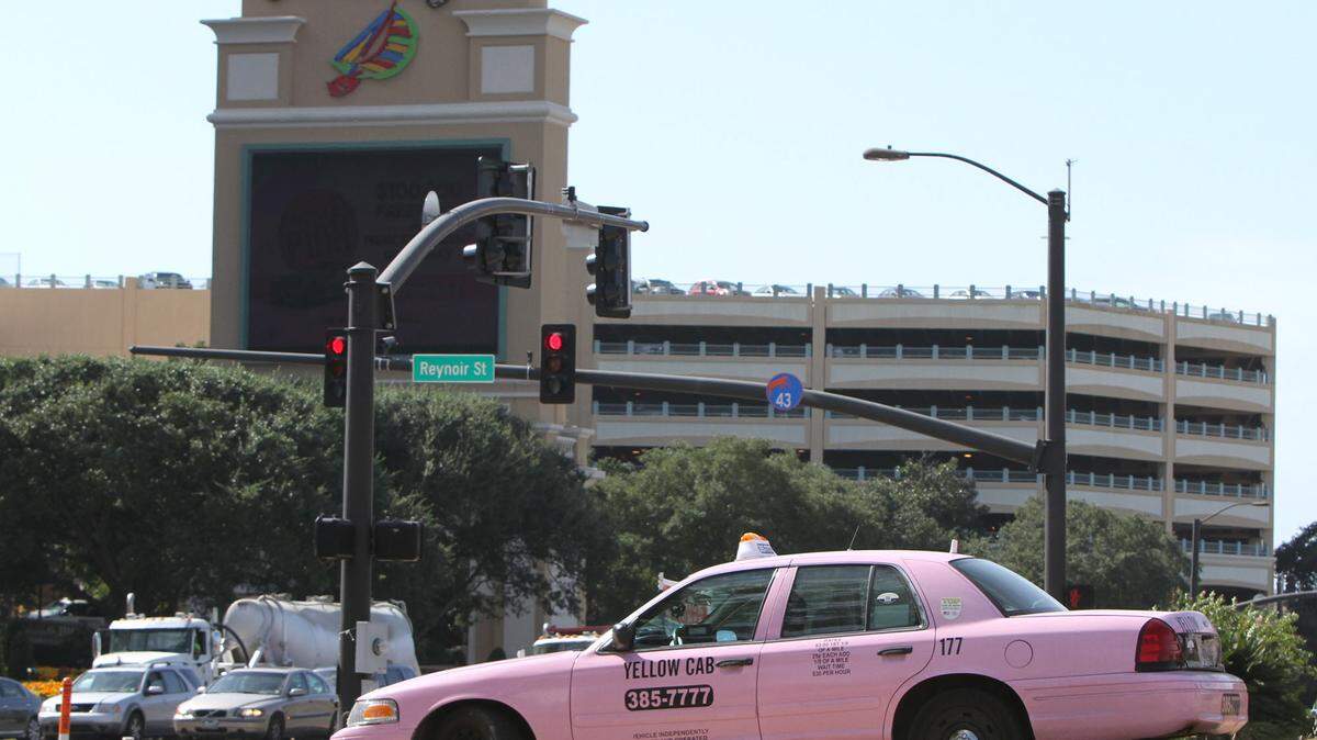 JOHN FITZHUGH/SUN HERALDA taxi waits Tuesday across the street from Beau Rivage for its turn to get in line for a fare at the Biloxi casino. Biloxi, D'Iberville and Gulfport are considering creating new regulations for the taxi industry in South Mississippi.