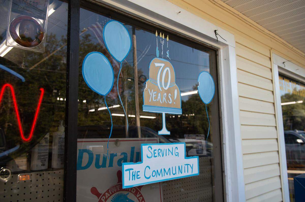 A sign celebrating the 70th anniversary of Hubbard’s Waveland Hardware on the store’s window in Waveland on Monday, Oct. 7, 2024. According to Hubbard, a segment local TV station WXXV did on the anniversary drew the attention of a major documentary crew.