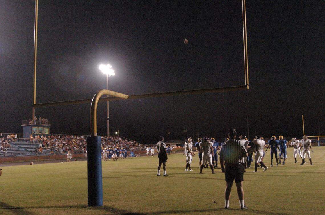 Bay High kicks an extra point to give them a 7-0 lead over Long Beach on Sept 26, 2005, one month after their stadium in Bay St. Louis was submerged in three feet of water by Hurricane Katrina.