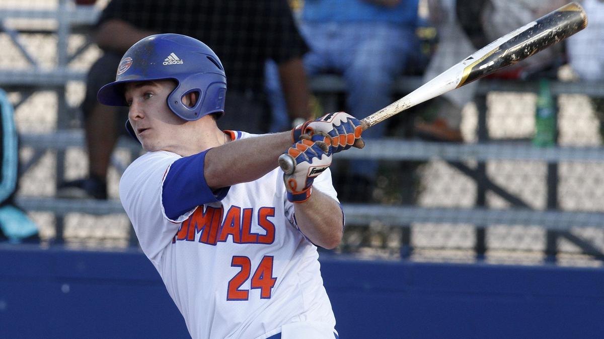Gulfport’s Blake Johnson hits a solo home run against Pascagoula during the first inning of their 6A playoff game at Herb Wilson Field in Gulfport on Friday, April 26, 2018.