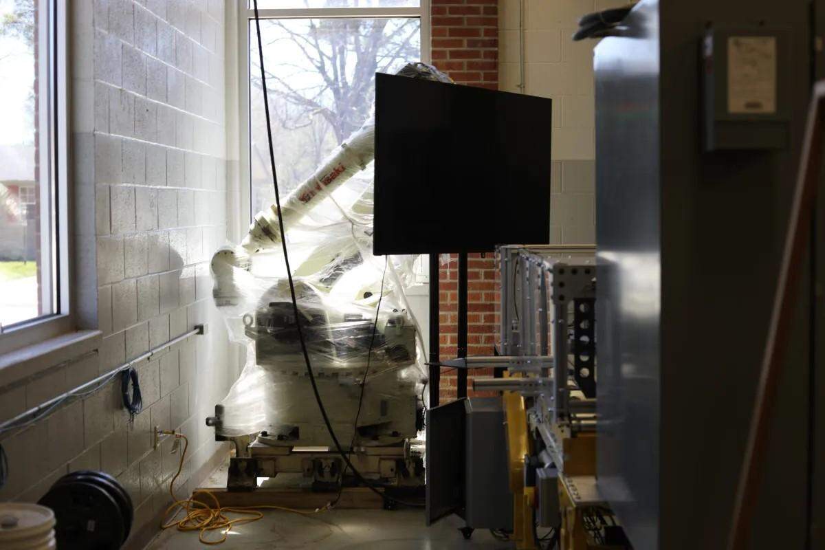 A robot that was donated to NEMCC has been sitting unused in Brian Warren’s classroom for four years because there is not enough space to safely train students on it.